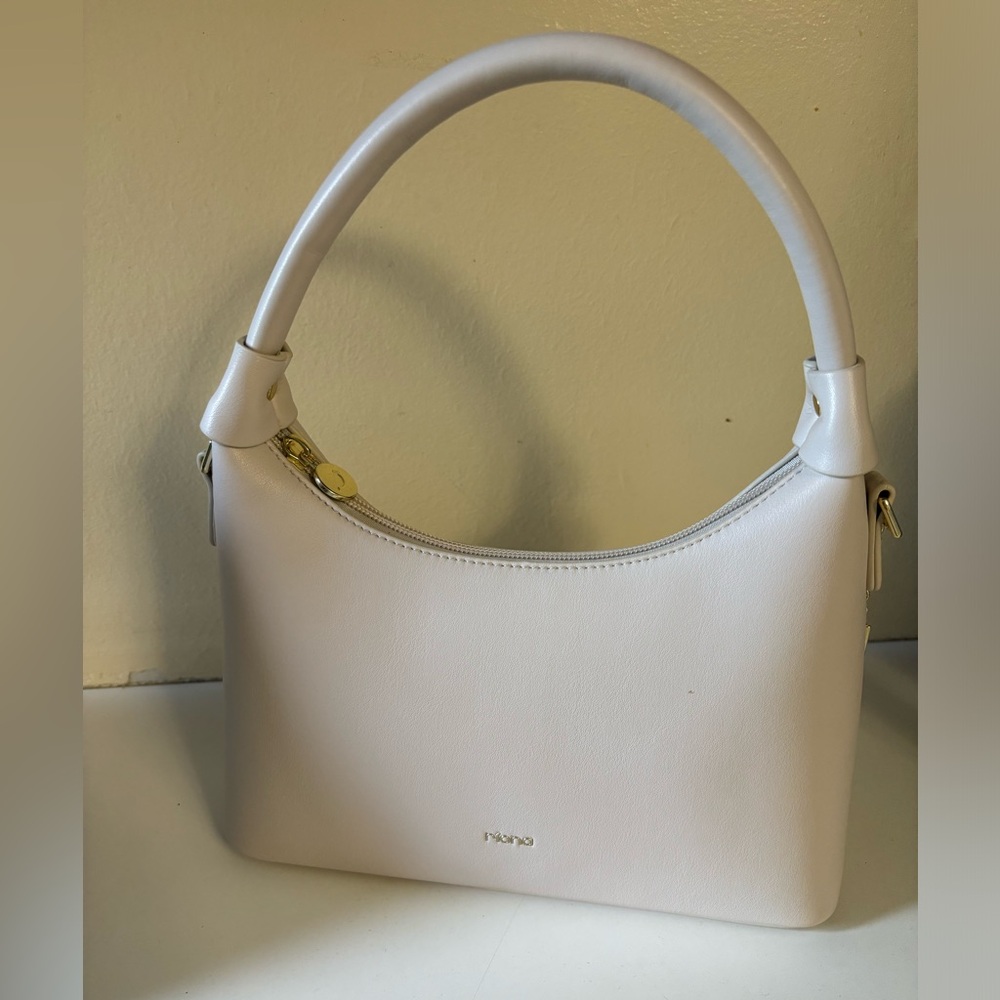 Cream Shoulder Bag with Gold Accents and Pebbled Texture